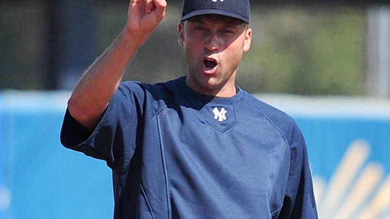 New York Yankees shortstop Derek Jeter practices with the team...