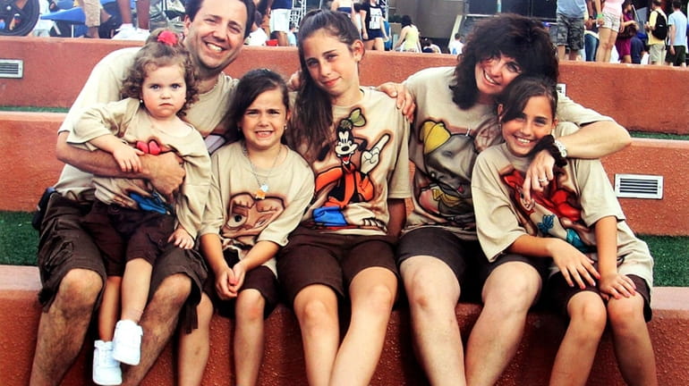 The DiMartino family (Left-Right): Ava, 4, James DiMartino, Alana, 8,...