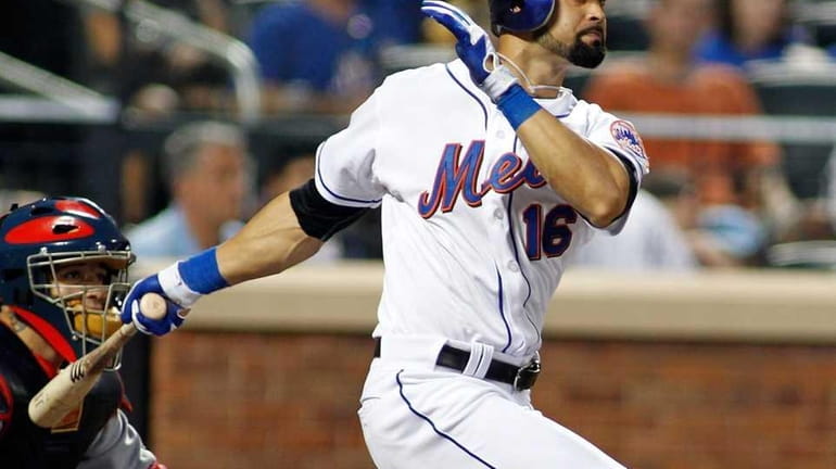 New York Mets' Angel Pagan #16 drives in two runs...