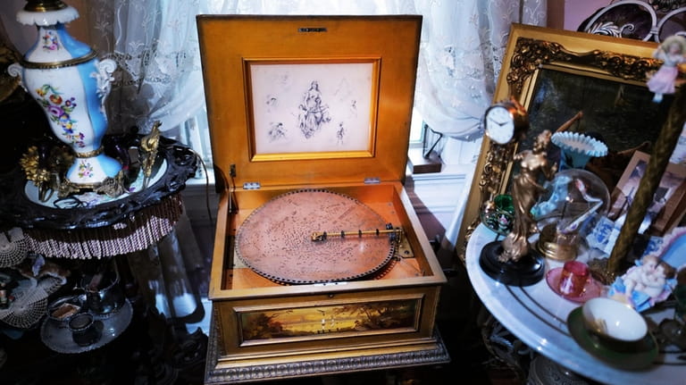An 1895 music box plays music from "The Tyrolean" in the music...