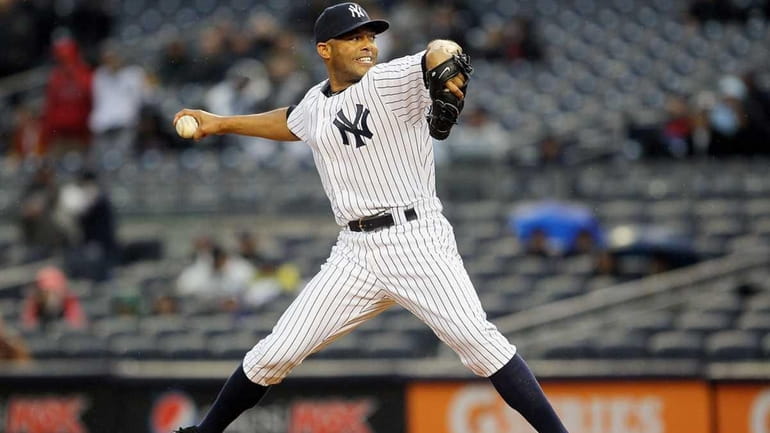 Mariano Rivera delivers a ninth-inning pitch against the Texas Rangers....