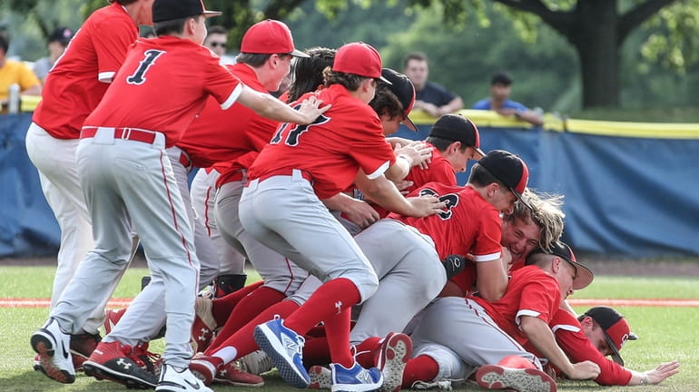 Center Moriches celebrates its 8-3 victory to become the Long...