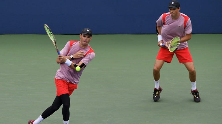 Bob Bryan and Mike Bryan play against against Feliciano Lopez...