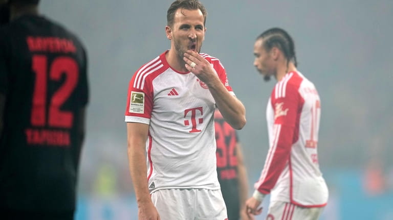 Bayern's Harry Kane reacts during the German Bundesliga soccer match...