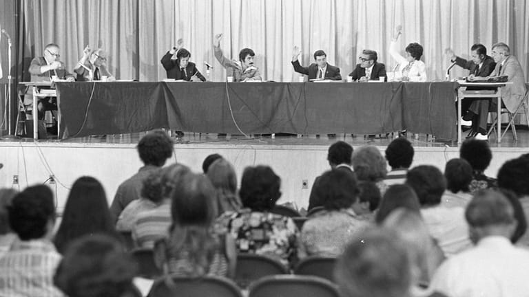 Island Trees School Board members on July 28, 1976, vote...