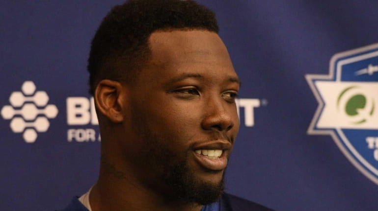 New York Giants defensive end Jason Pierre-Paul speaks with the...