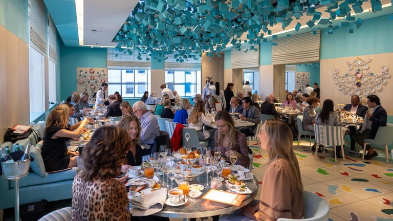 The brunch crowd at the Blue Box Café by Michelin-starred chef Daniel Boulud.