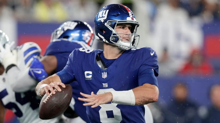 Daniel Jones of the Giants throws a pass during the second...