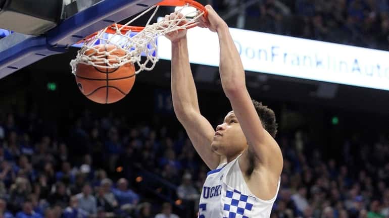Kentucky's Kevin Knox dunks during the second half of the...
