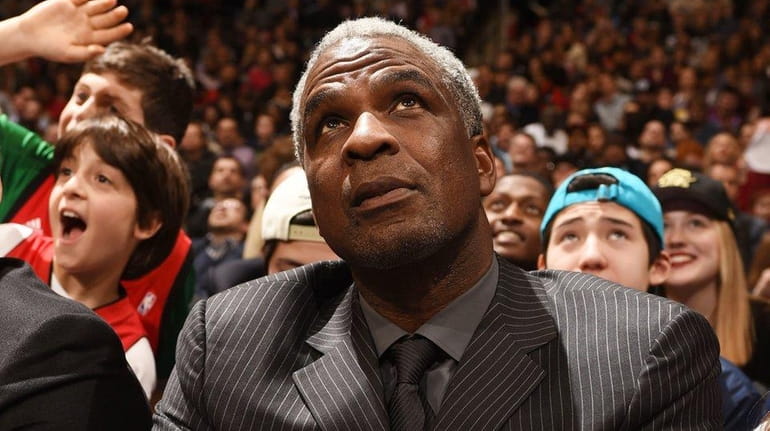 Former NBA player Charles Oakley looks on during a game...
