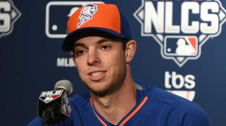 New York Mets starting pitcher Steven Matz speaks to the...