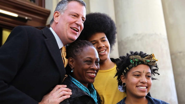 Bill de Blasio and his family at their polling place...