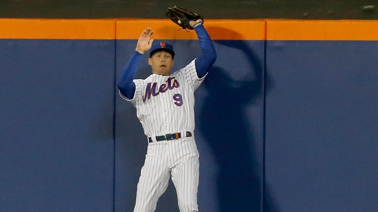 Brandon Nimmo #9 of the New York Mets makes a...