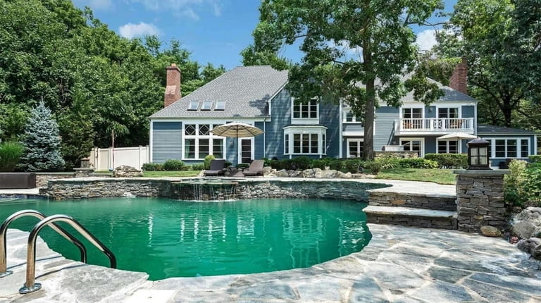 Priced at $2.299 million, this Colonial on Cherrywood Road is...