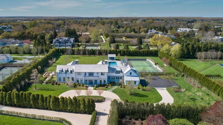 Priced at $17,900,000 and sitting on a 2.3-acre lot is this eight-bedroom,...