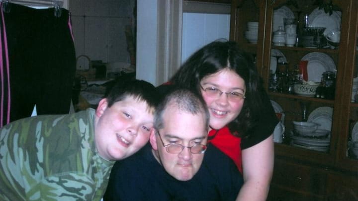 Mike Henley and with his children, Brandon and Courtney. (Jan....