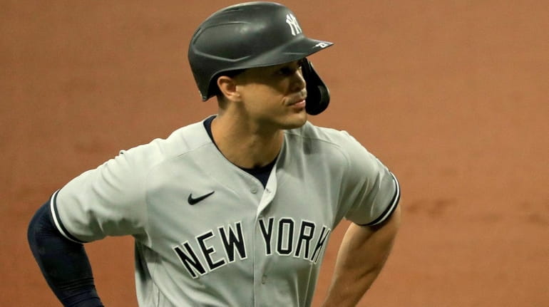 Giancarlo Stanton of the Yankees looks on during Game 1...