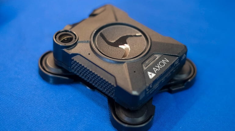 An NYPD Axon-Body2 model body camera is displayed during a...