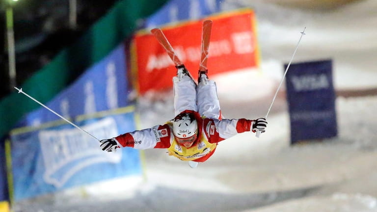 First-place finisher Mikael Kingsbury, of Canada, competes in the men's...