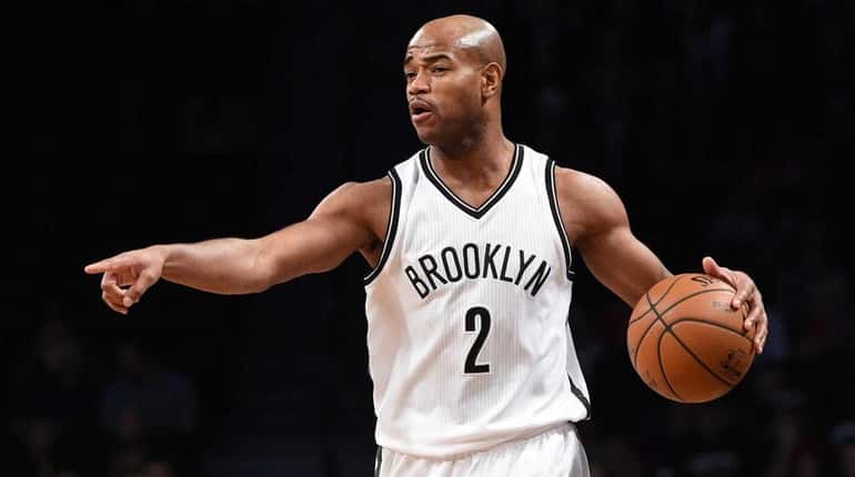 Jarrett Jack directs his teammates against the Pistons during a...