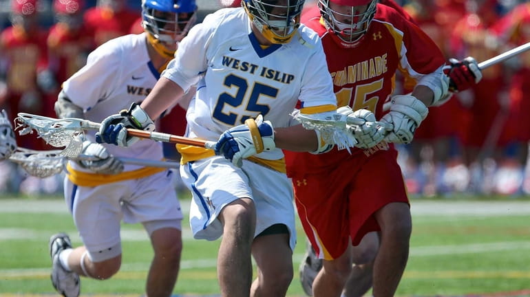 Chaminade's John McDaid & West Islip's Kyle Ziegler chase the...