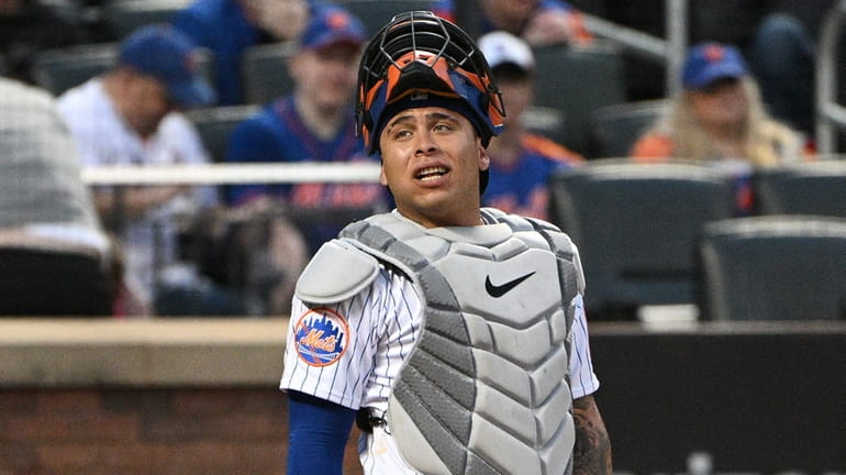 Mets catcher Francisco Alvarez looks on during the first inning...