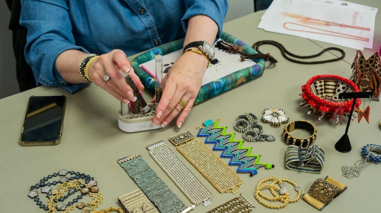 Sondra Goldman of Rego Park displays some of her handmade beadwork at...