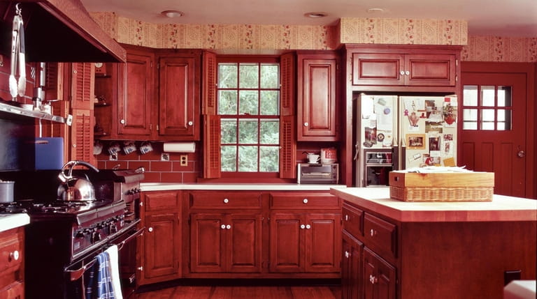 The Grubmans' old kitchen in Syosset was too dark and "a...