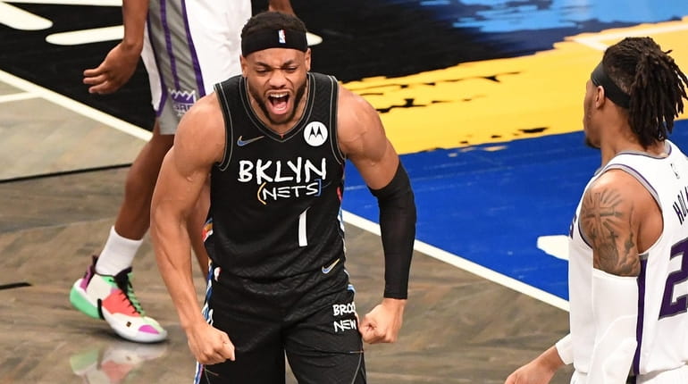 Nets guard Bruce Brown reacts after he scores a basket...