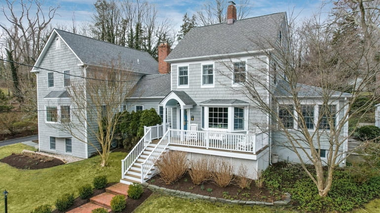 This 1824 home in Setauket sits on two acres of...