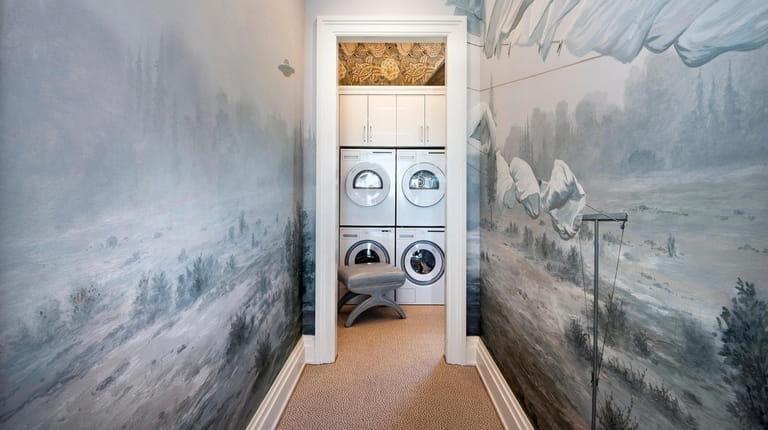 The laundry room designed by Courtney Sempliner.