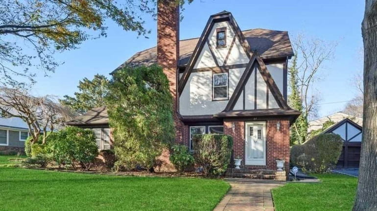 The brick-and-stucco Tudor was built in 1927 and retains many original...