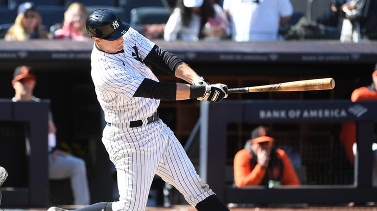 Yankees' DJ LeMahieu doubles against the Baltimore Oriolesduring the seventh...