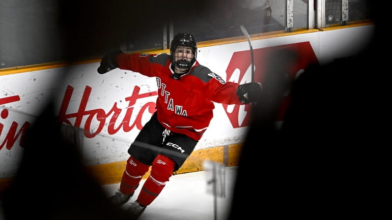 Ottawa's Daryl Watts (9) celebrates her second goal of the...