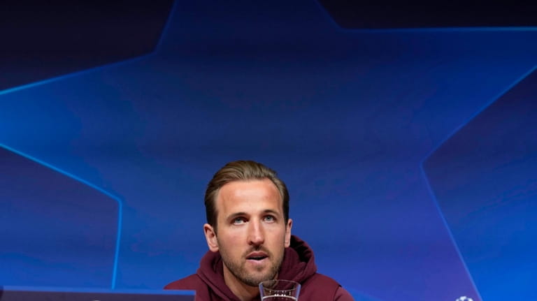 Bayern's Harry Kane attends a news conference in Munich, Germany,...