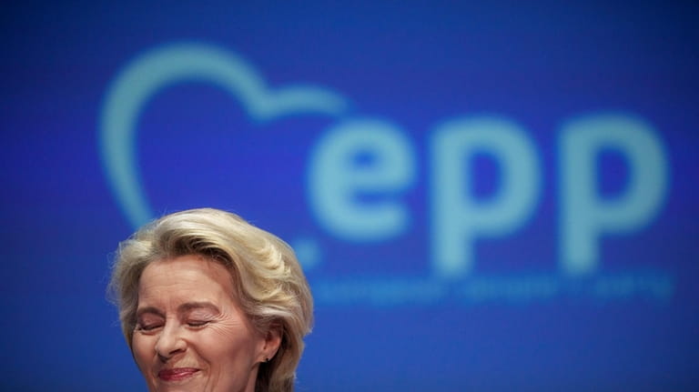 European Commission President Ursula von der Leyen smiles during her...