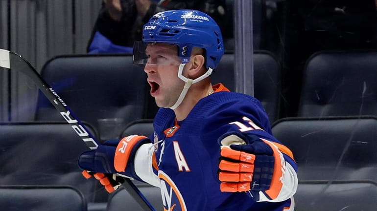 Josh Bailey of the Islanders celebrates his third-period goal against the Sabres...