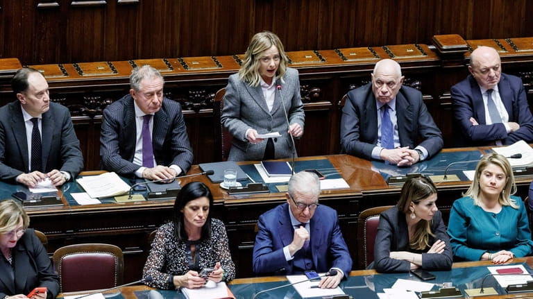 Italian Premier Giorgia Meloni, top center, addresses the Chamber of...