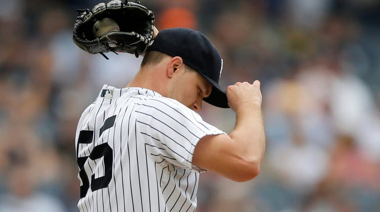 Sonny Gray of the New York Yankees reacts on the...