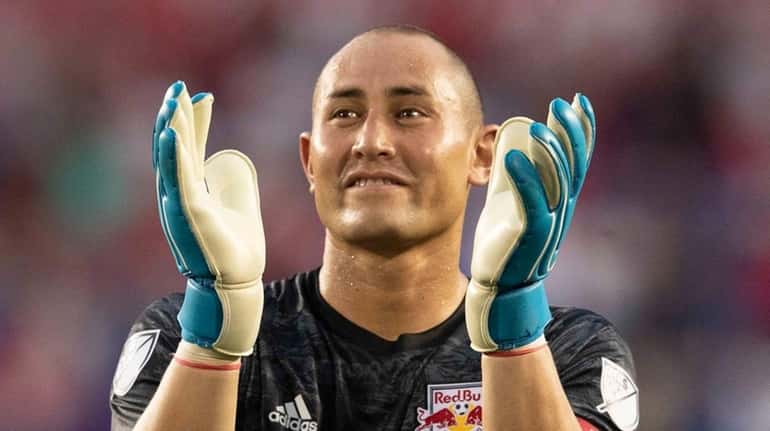 Red Bulls goalkeeper Luis Robles applauds fans at the end...