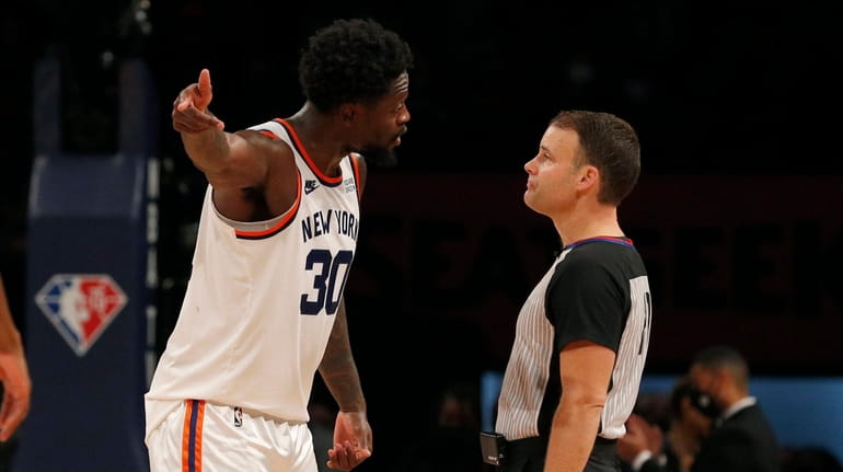 Julius Randle #30 of the Knicks argues with referee Mark...