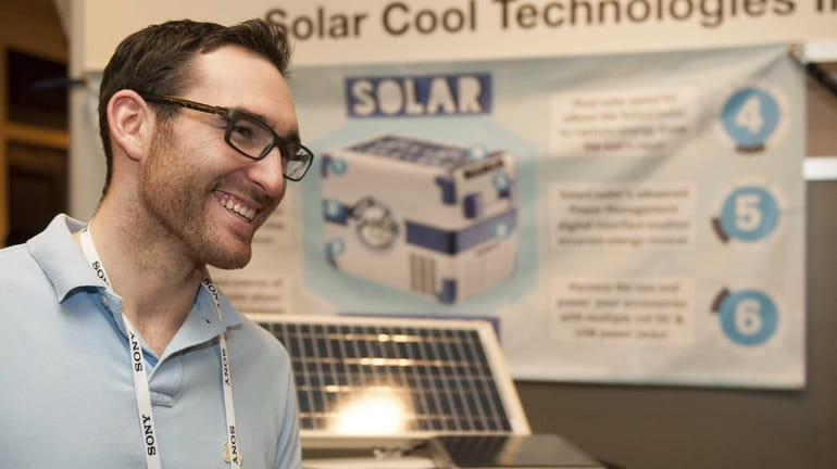 Ryan McGann of Shoreham, founder of Solar Cool Technologies Inc.,...