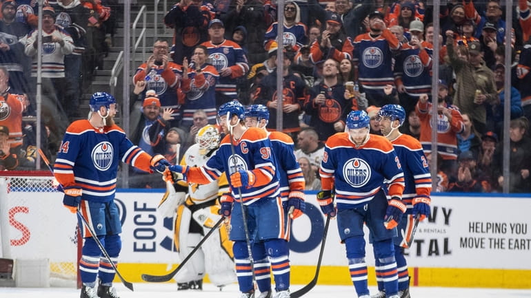 Edmonton Oilers celebrate a goal against the Pittsburg Penguins during...
