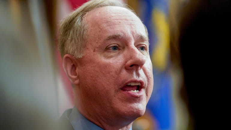 Wisconsin's Republican Assembly Speaker Robin Vos talks to reporters at...