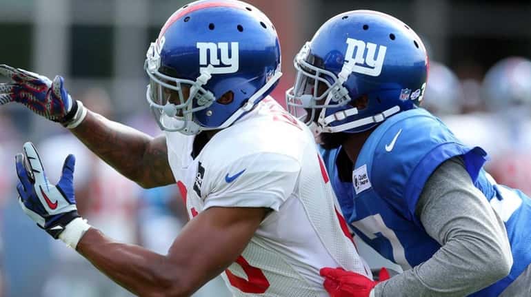 New York Giants wide receiver Julian Talley can't catch a...