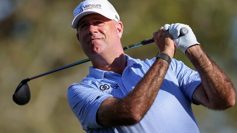 Stewart Cink tees off on the fifth hole during the...