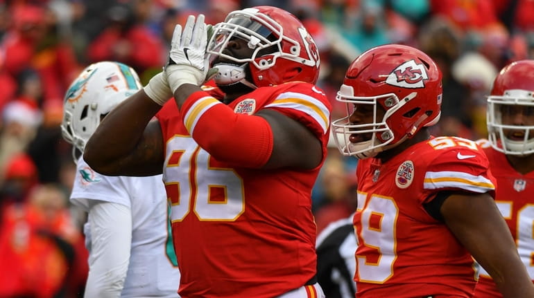Nose tackle Bennie Logan of the Chiefs celebrates a tackle...