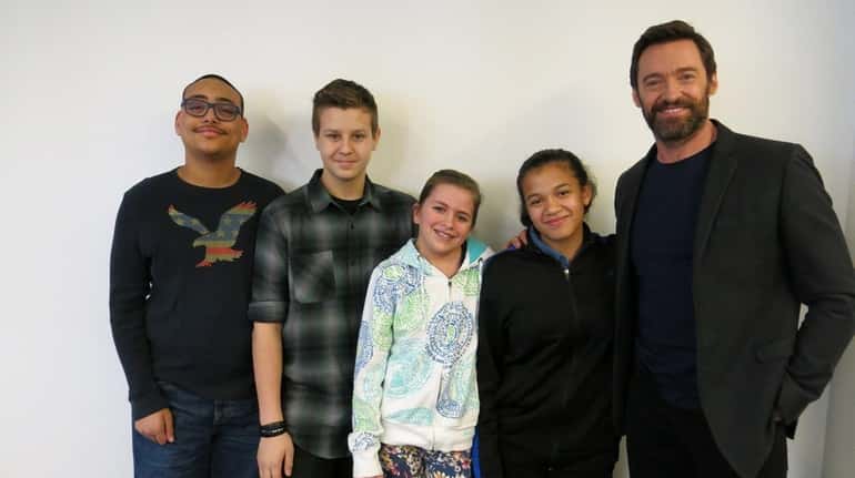 Actor Hugh Jackman with Kidsday reporters from left, Paul Bluemke,...
