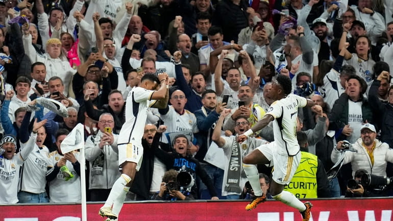 Real Madrid's Rodrygo celebrates scoring his side's second goal during...