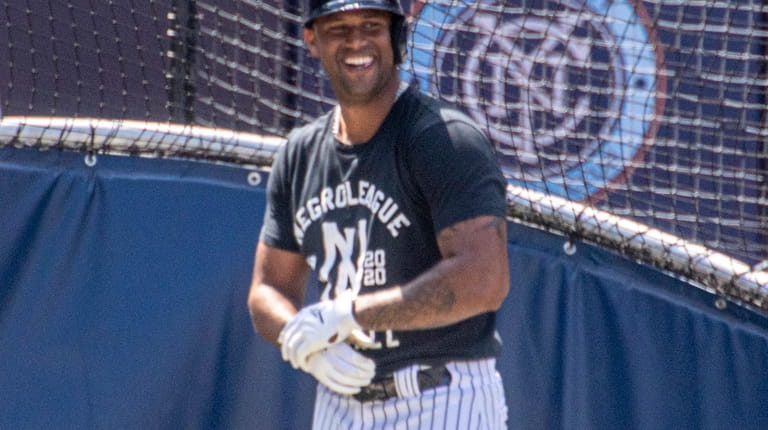 The New York Yankees' CF Aaron Hicks taking batting practice...